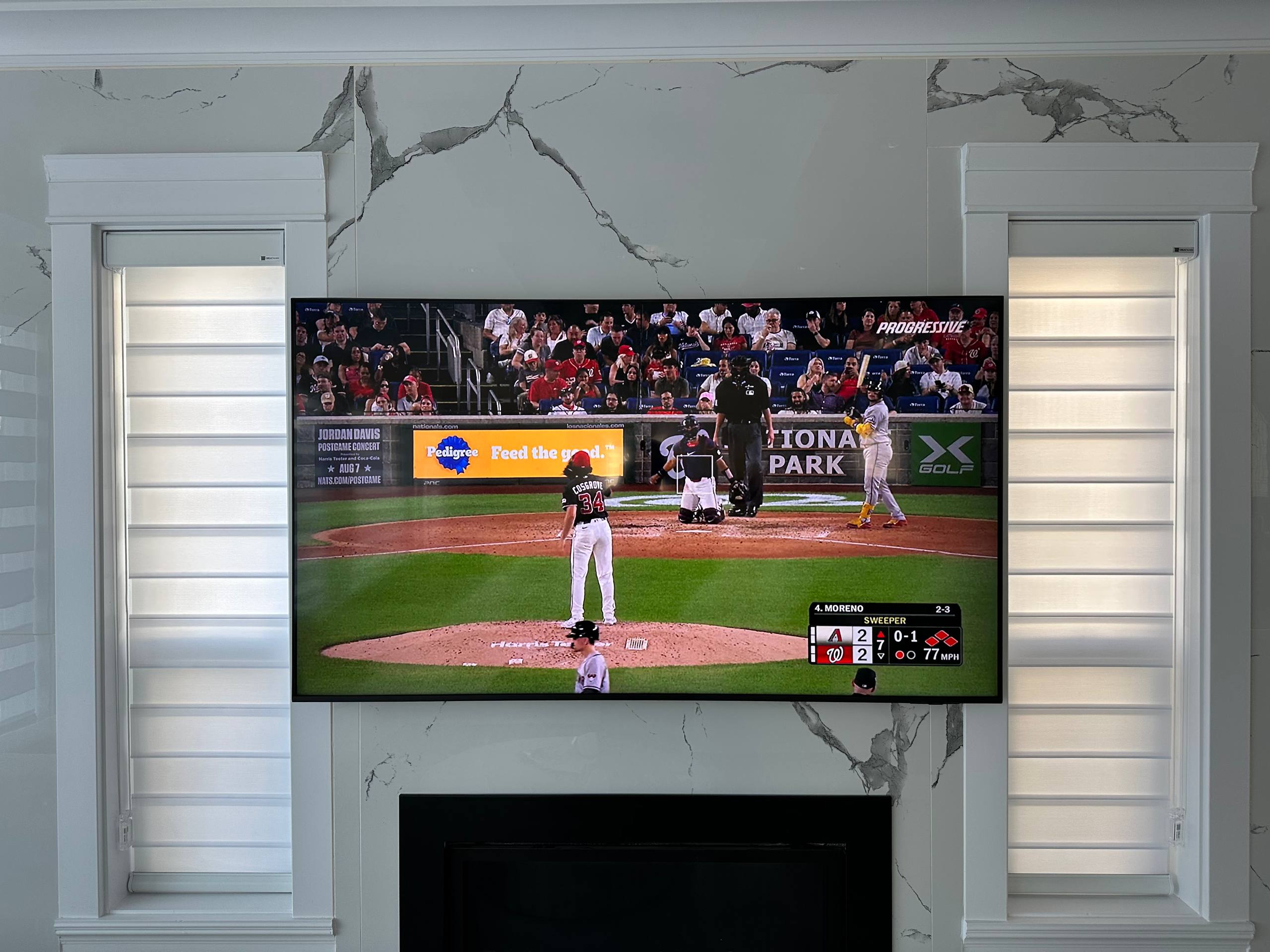 65" TV Wall Mount on Ceramic Tile Fireplace Feature Wall completed by Taskio in Burnaby